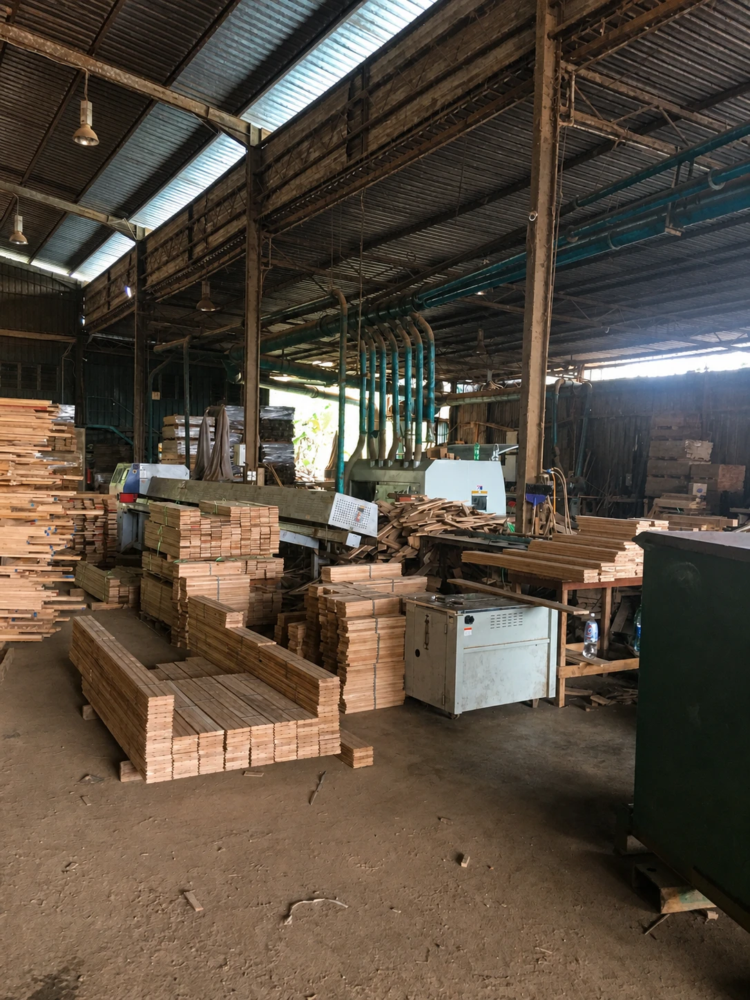 Imperium Materials timber workshop with prepared wood sections and manufacturing machinery