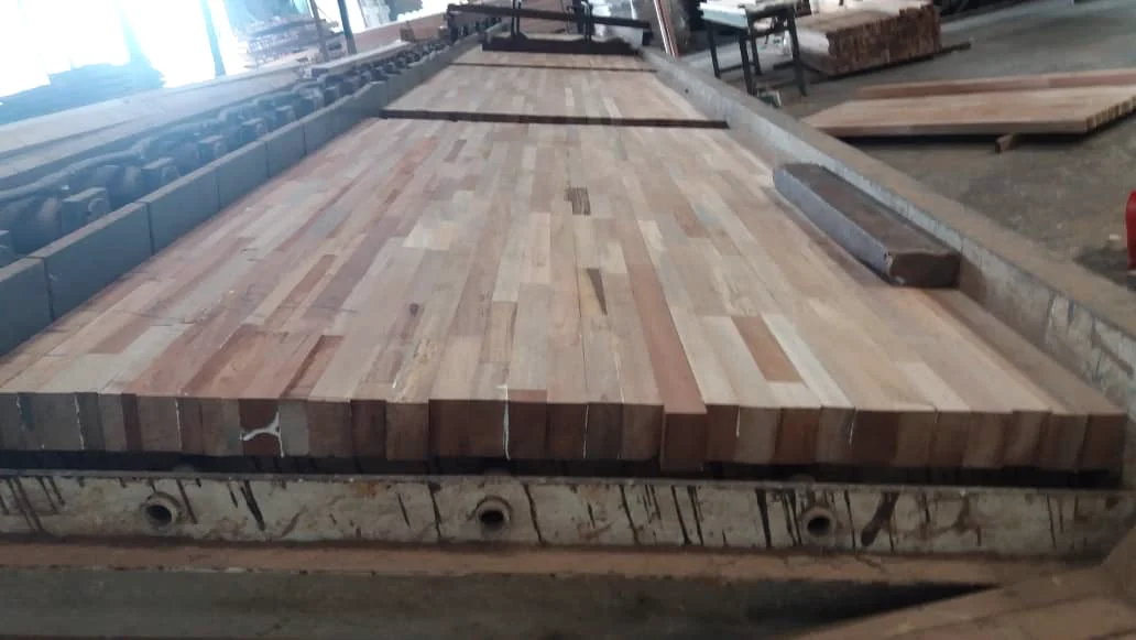 Glue laminated timber boards aligned during the manufacturing process