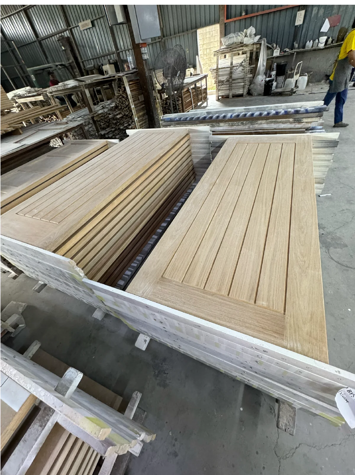 Unfinished solid oak door panels prepared in the timber workshop